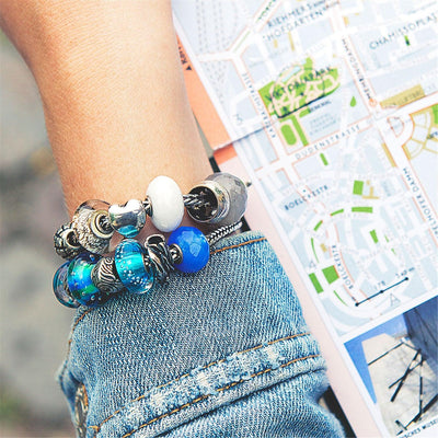 Ezüst & Türkiz Lábnyomok Bead - Trollbeads Ékszerek Magyarország